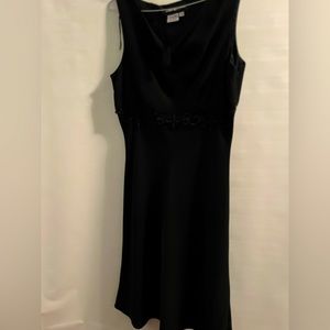 Black dress with black bead accents No zipper.